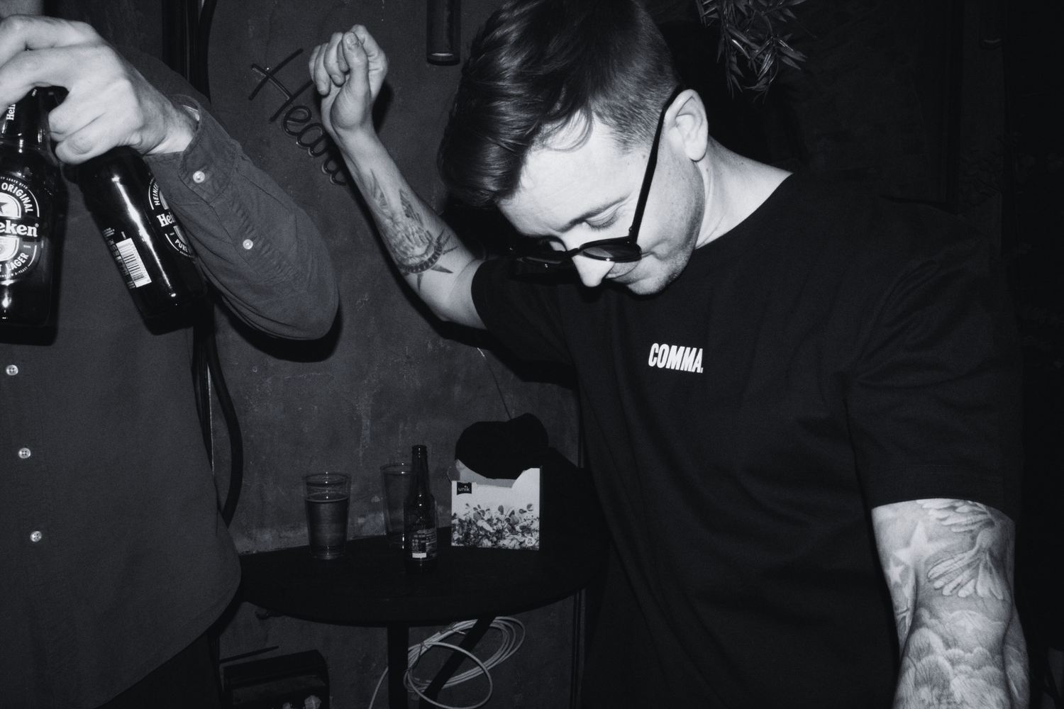 COMMA. ambassador in the signature Tee in Black at Smelteverket at OLING x Hovland x Marensius.